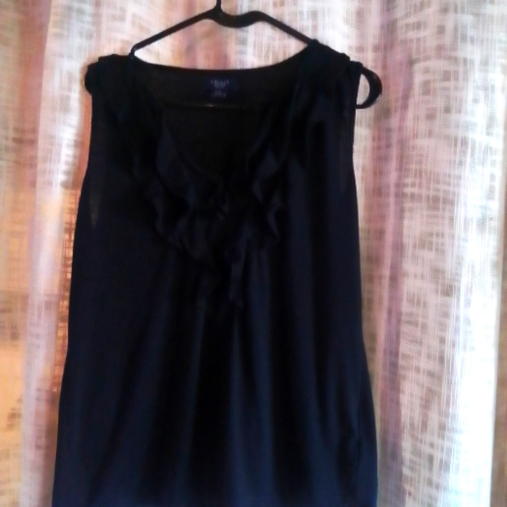 Black sleeveless top with ruffles